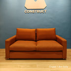 Sample 2 seater brown Chalet half leather sofa at 180cm in our buyer's gym