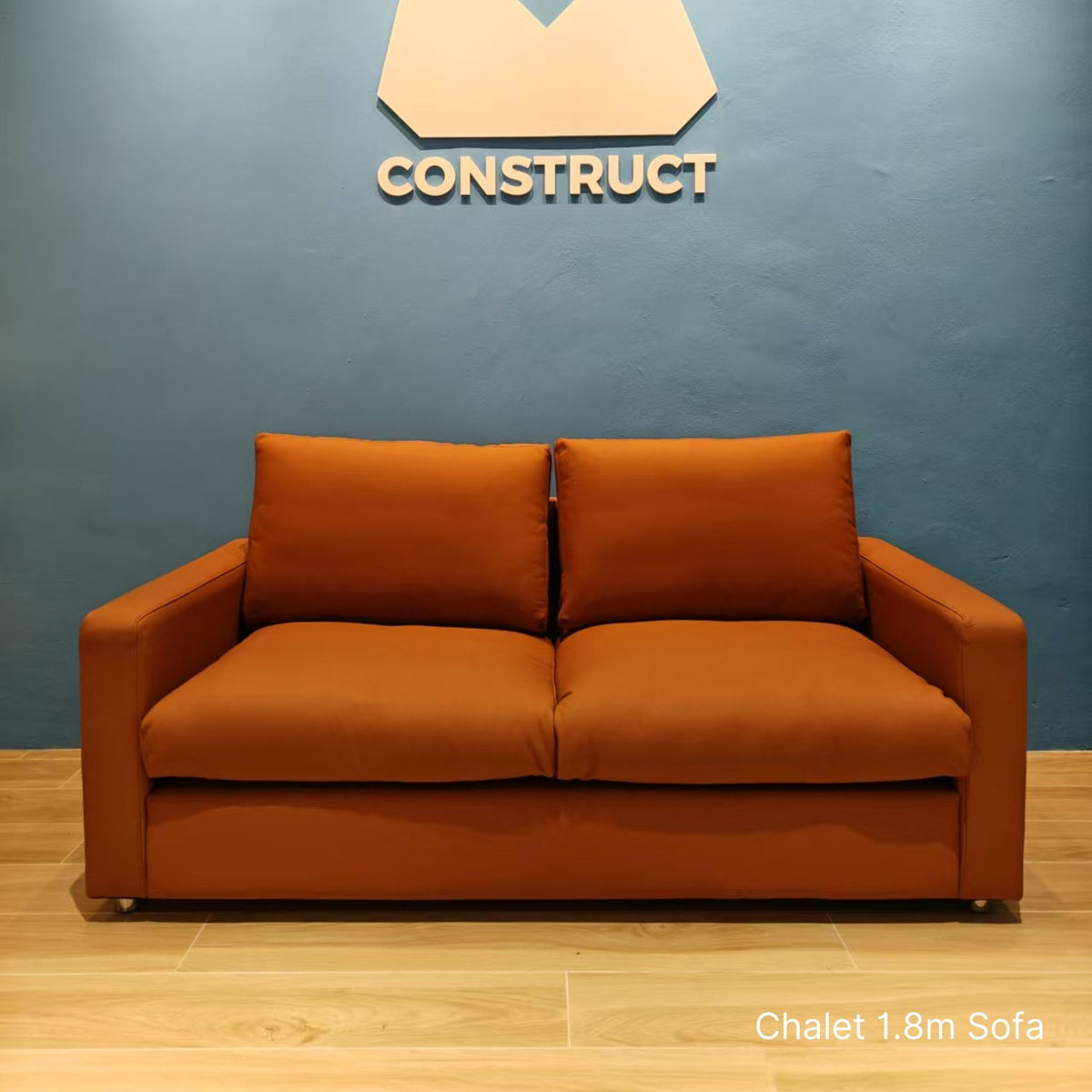 Sample 2 seater brown Chalet half leather sofa at 180cm in our buyer's gym
