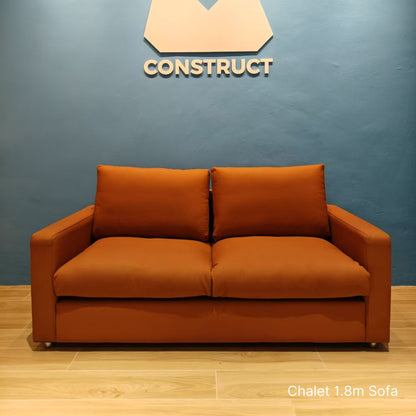 Sample 2 seater brown Chalet half leather sofa at 180cm in our buyer's gym