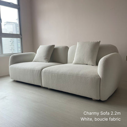 Delivered charmy 2 seater 220cm white boucle fabric sofa in customer's living room