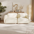 White sofa in a modern living room with decor elements.