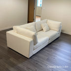 Claudia 3 seater white fabric sofa at 2.4m