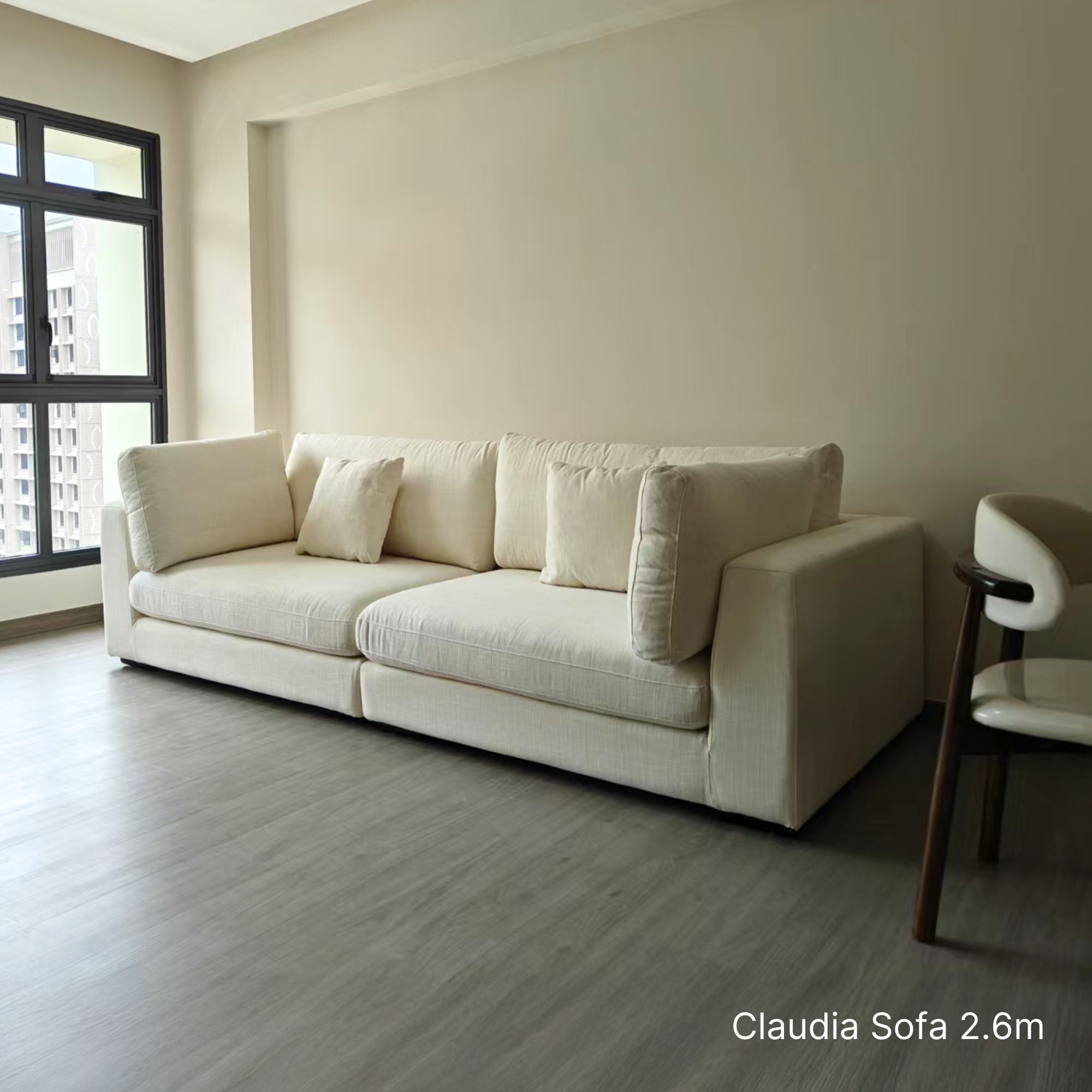 Claudia 4 seater white fabric sofa at 2.6m