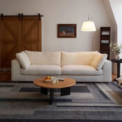 Claudia fabric sofa white in living room setting