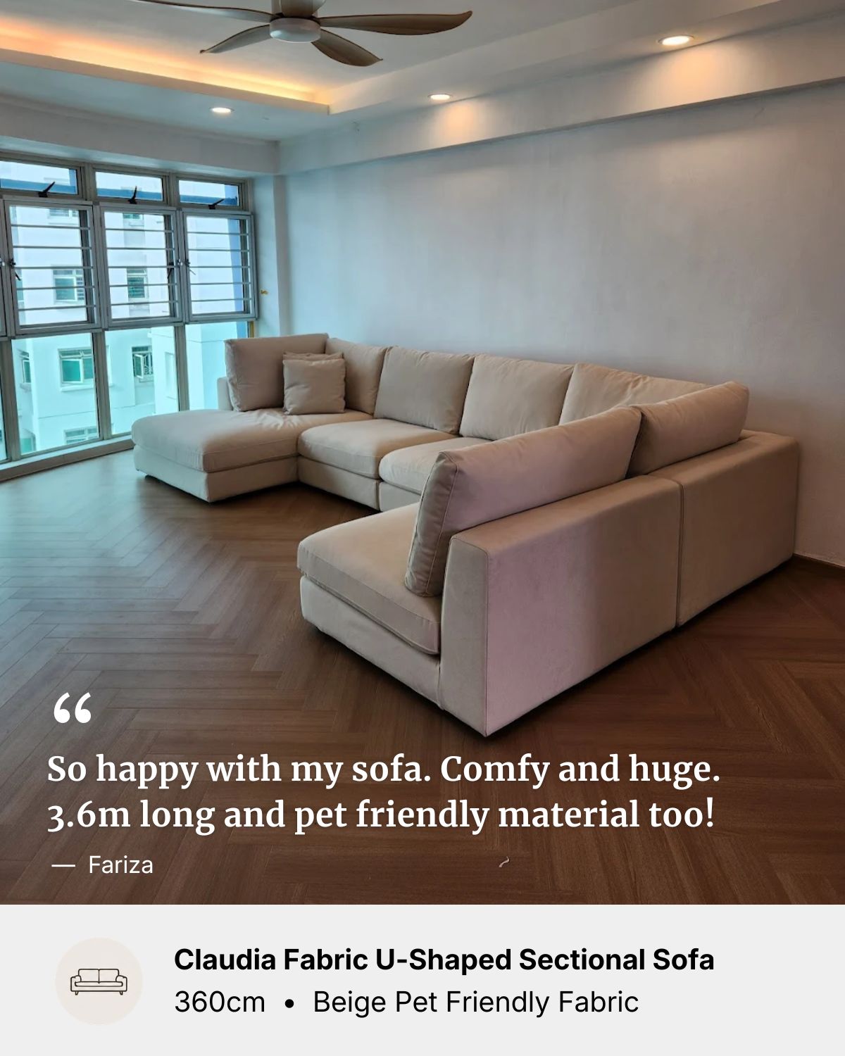 Beige pet friendly fabric U-shaped sectional sofa in a room with large windows.