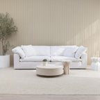 White sofa in a modern living room with neutral decor