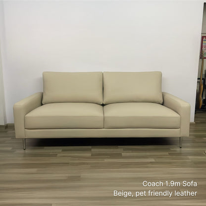 2 seater 190cm Coach faux leather sofa in beige pet friendly leather