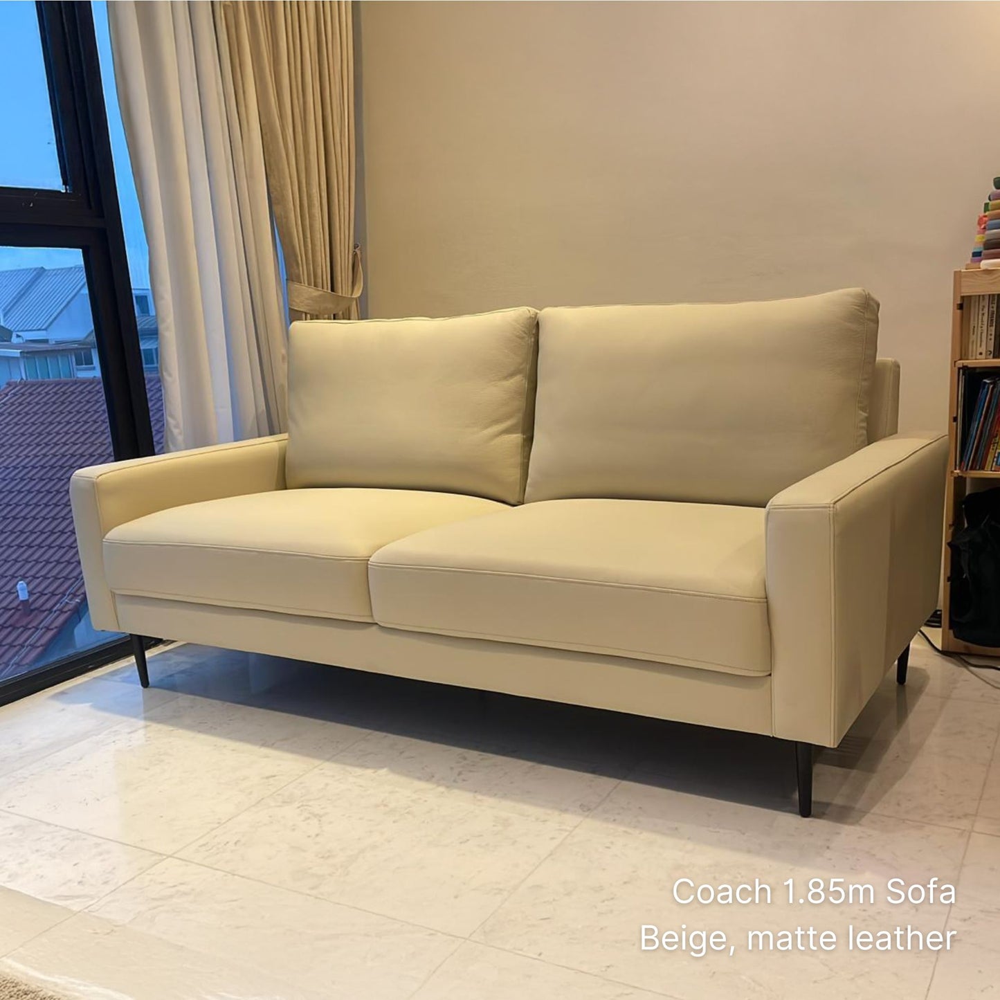 Delivered 2 seater 185cm leather sofa sample in beige in living room