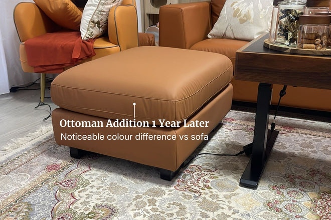 Shows an ottoman added later on with clear colour difference vs sofa