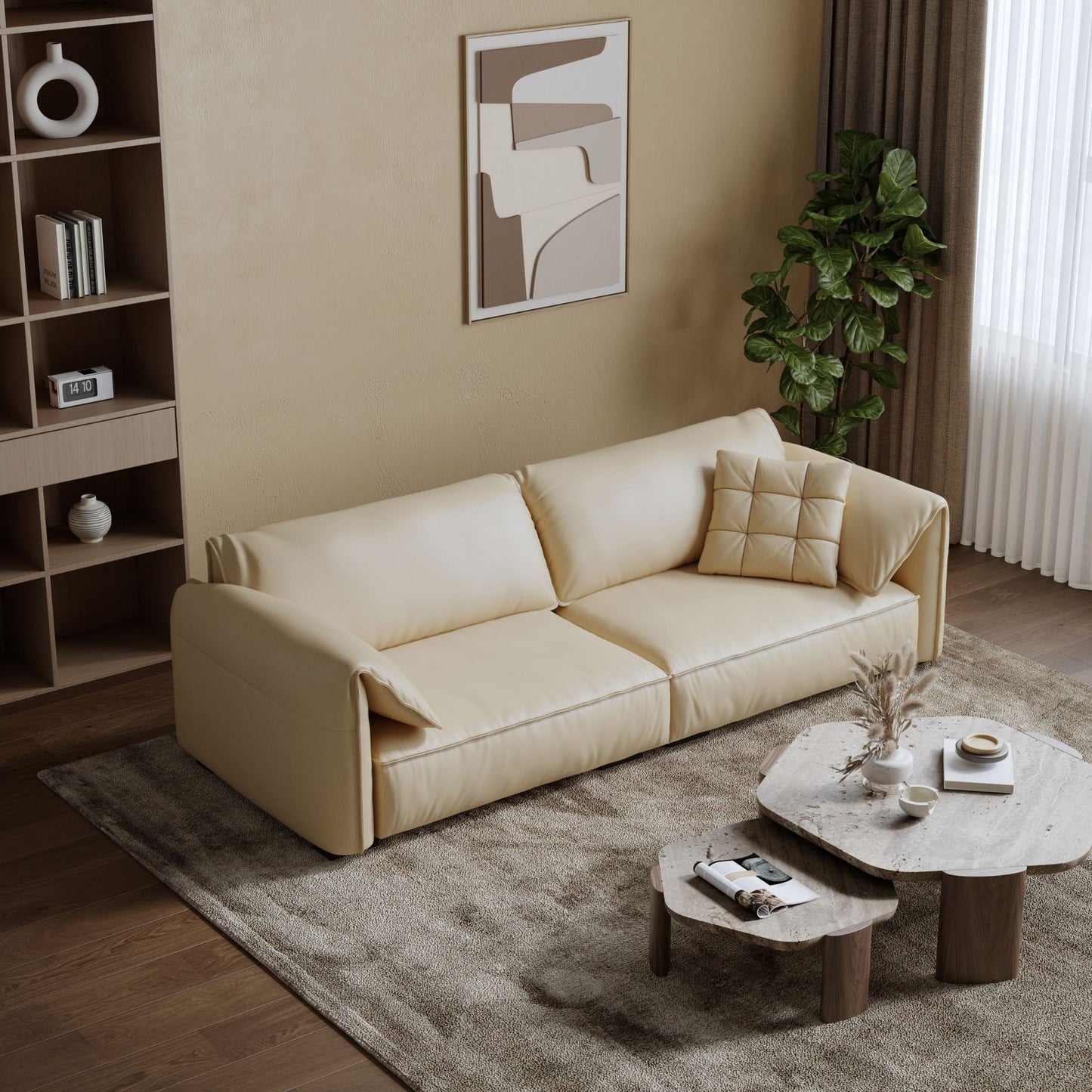 Beige sofa in a living room with a coffee table and decorative items.