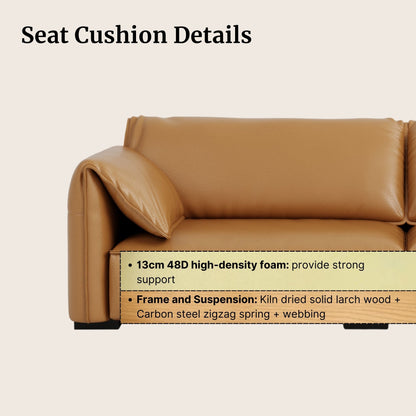 Brown leather sofa with seat cushion details on a beige background