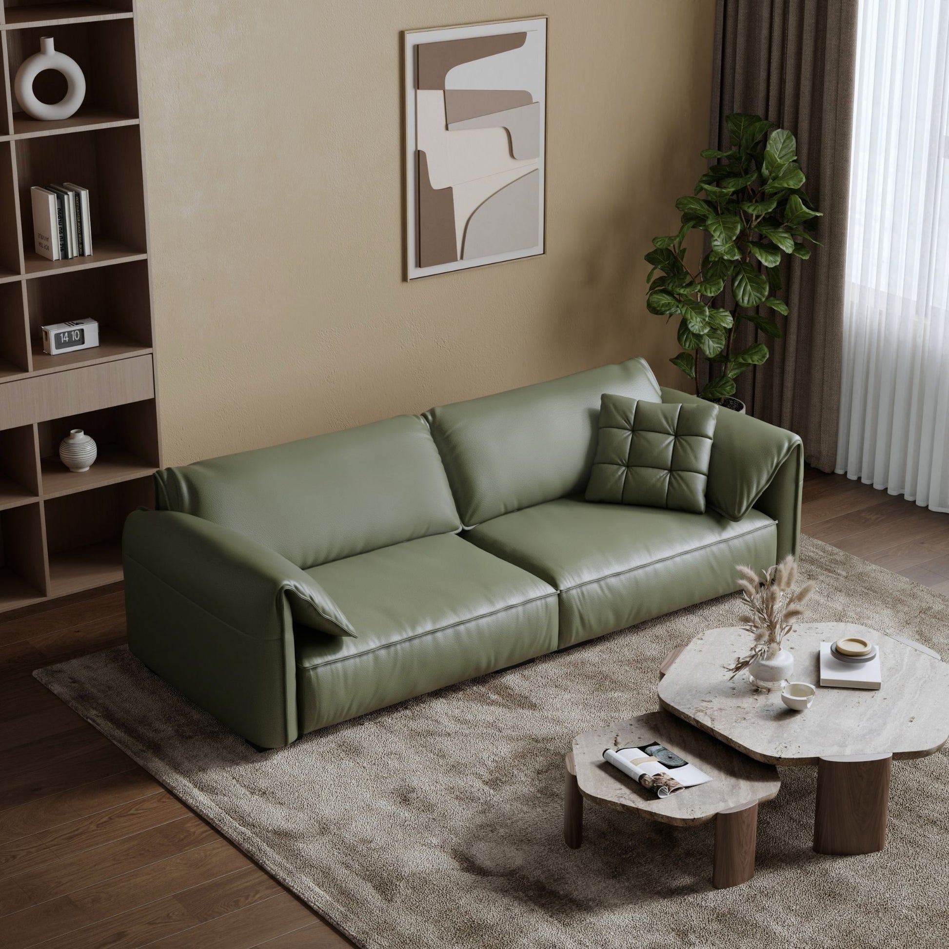 Green sofa in a living room with a coffee table and decorative items.