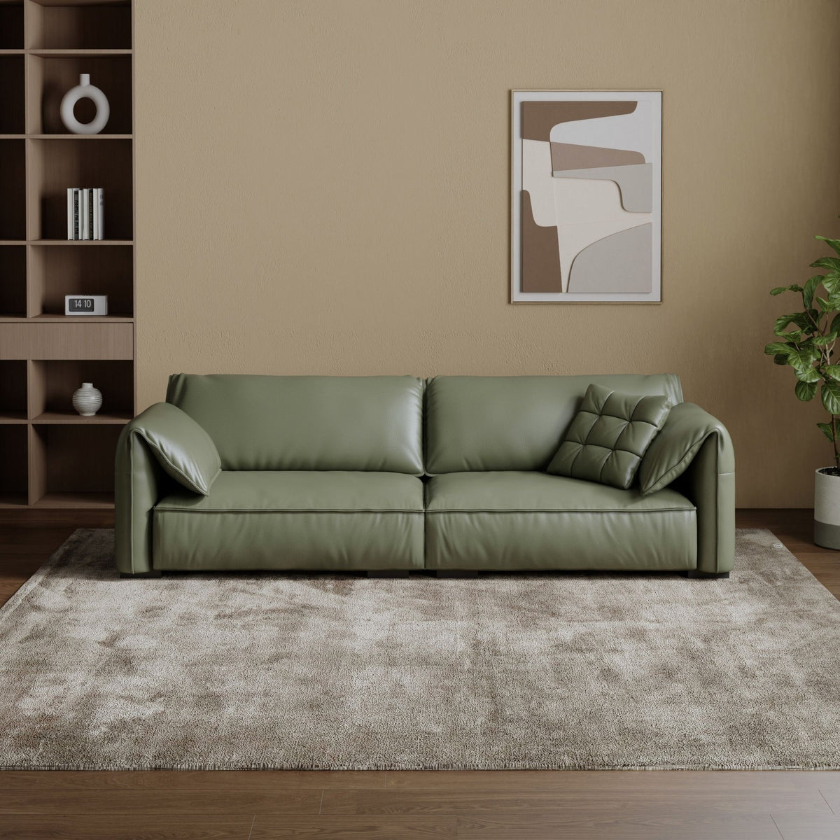 Green sofa in a living room with a abstract painting on the wall.