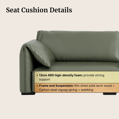 Green sofa with seat cushion details on a beige background