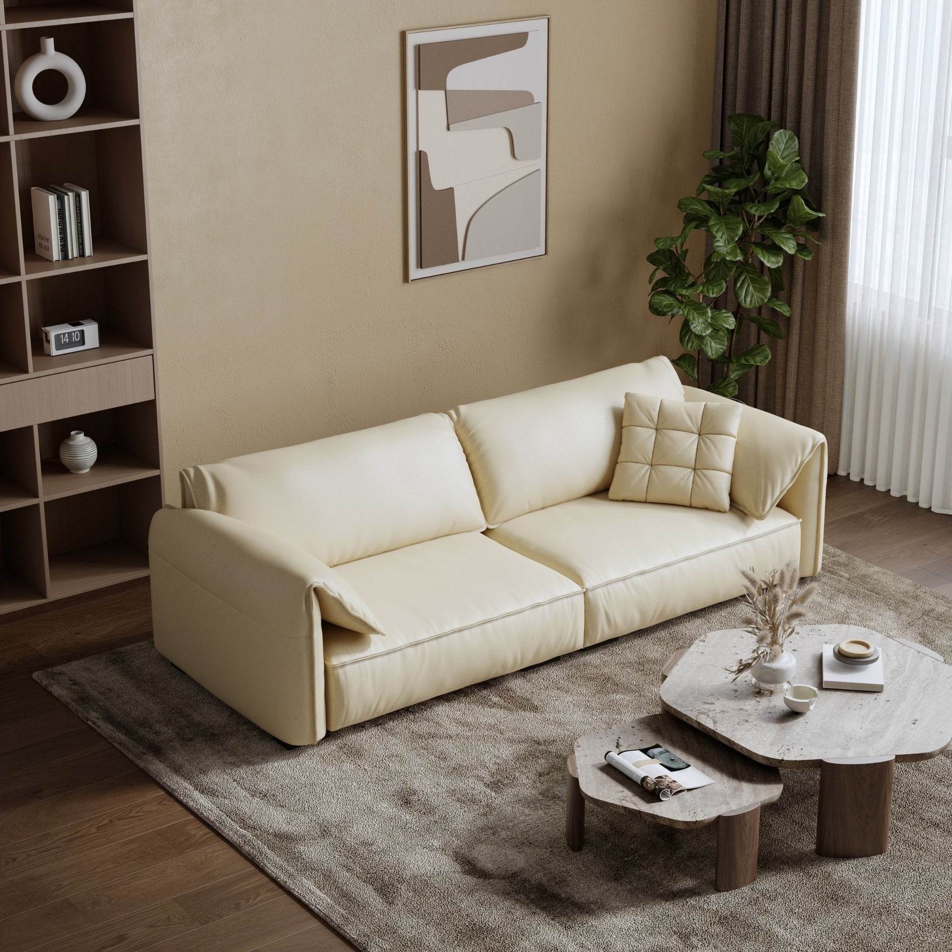 White sofa in a living room with a coffee table and decorative items.