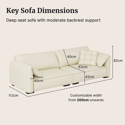 White sofa with dimensions labeled on a beige background
