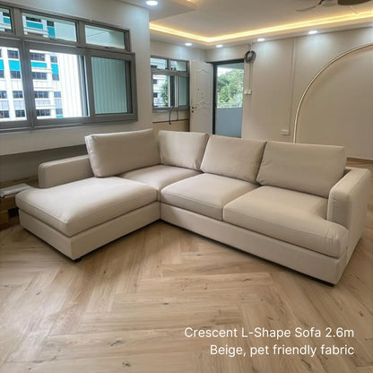 4 seater Crescent L-shaped sectional sofa with left chaise in beige pet friendly fabric