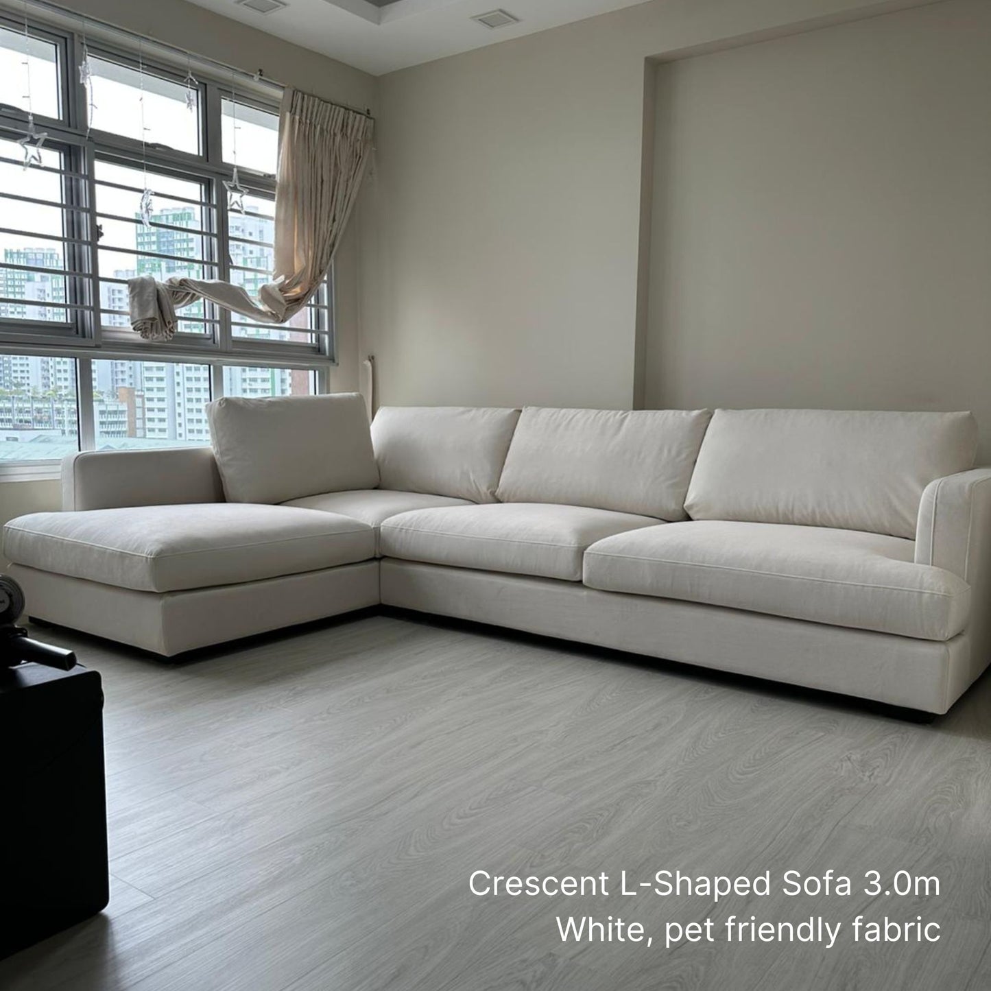 Crescent 5 seater 300cm white pet friendly fabric L-shaped sectional sofa with left chaise delivered to our customer's living room