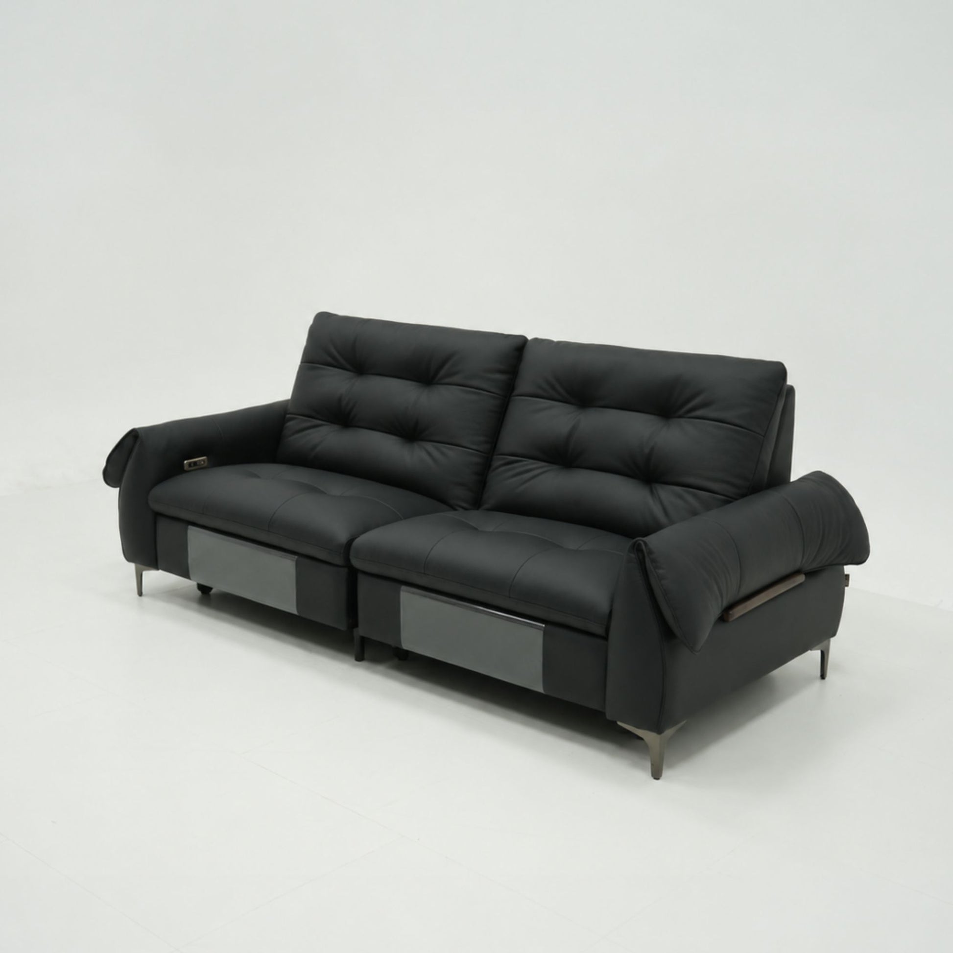 Black leather sofa on a white background