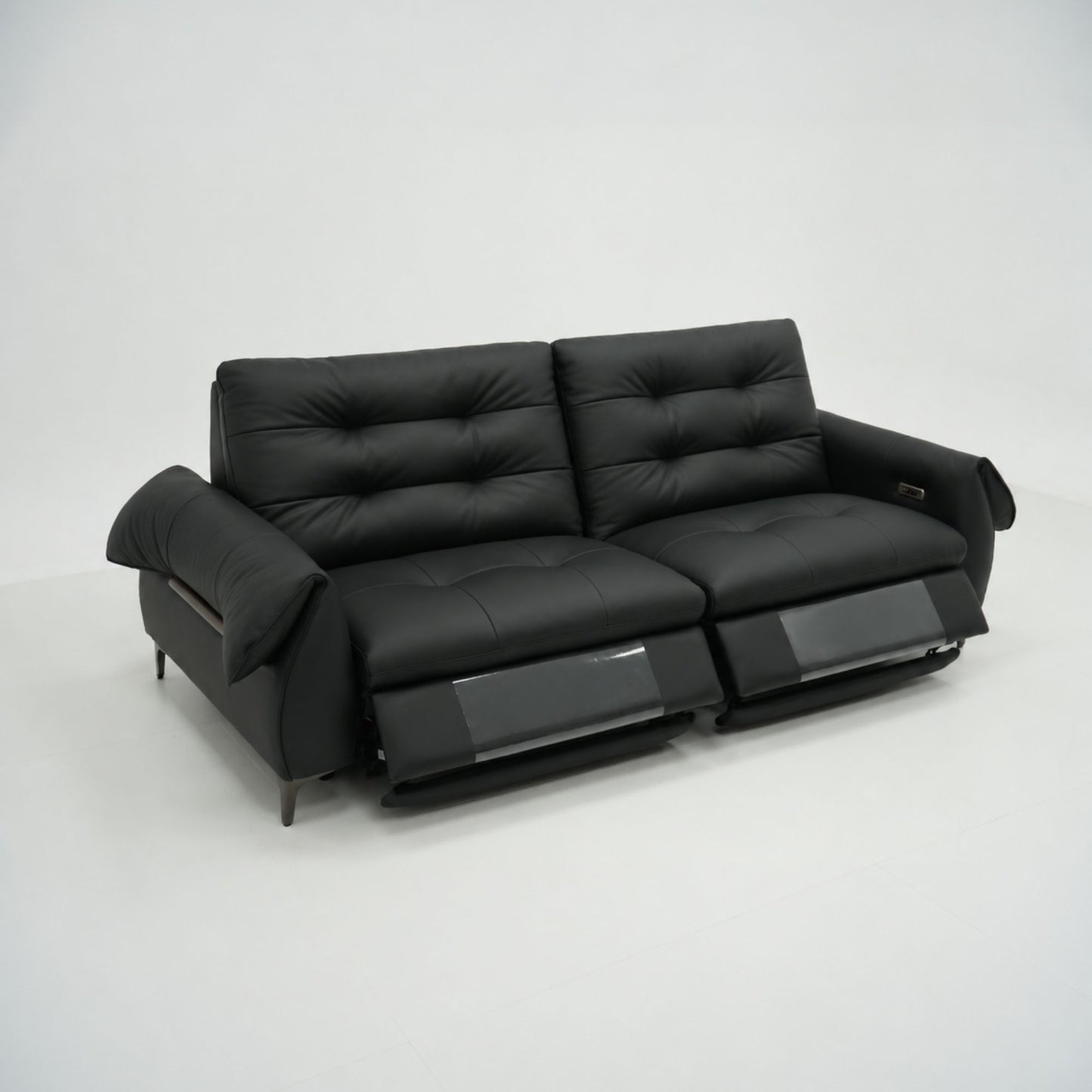 Black leather sofa on a white background
