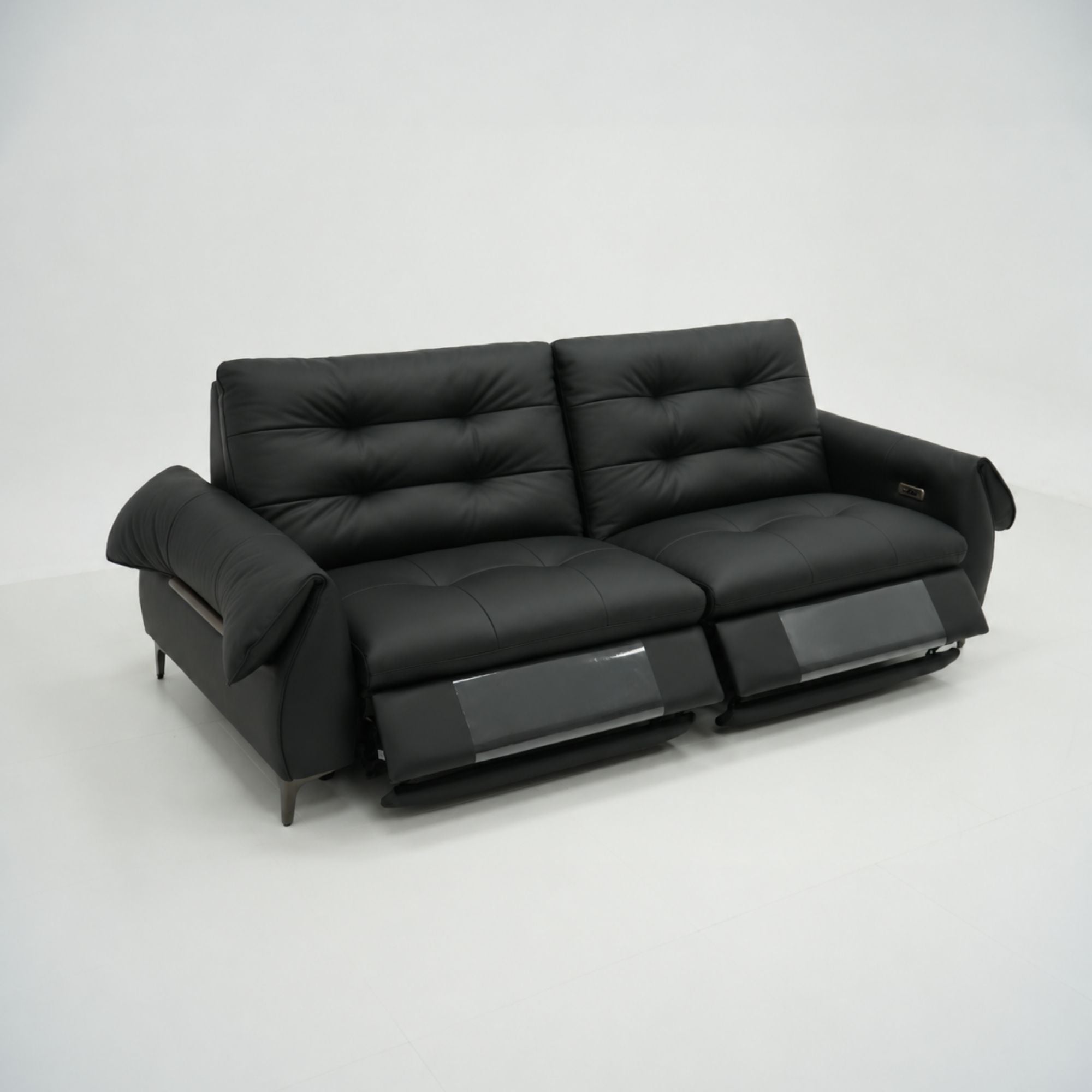 Black leather sofa on a white background