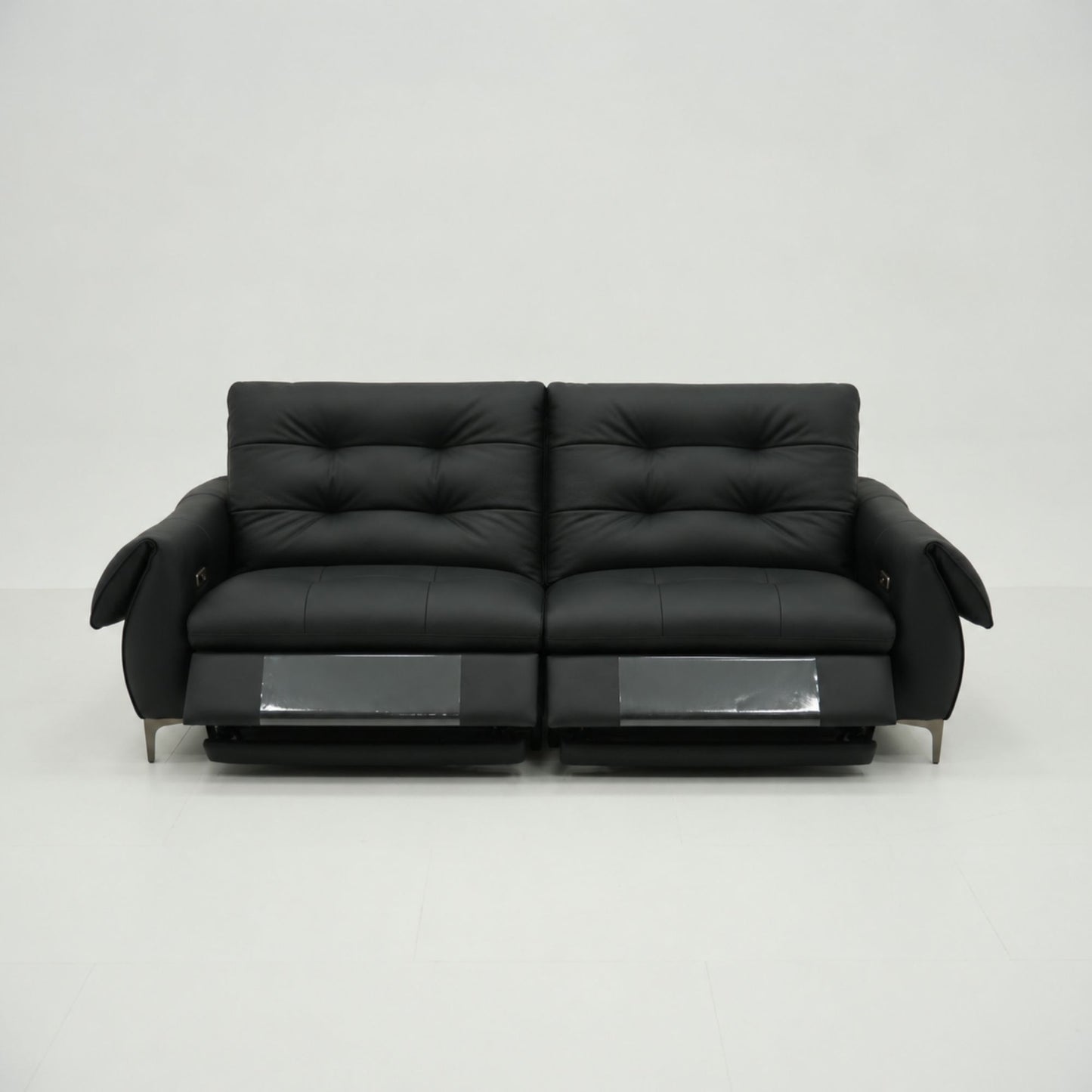 Black leather sofa on a white background