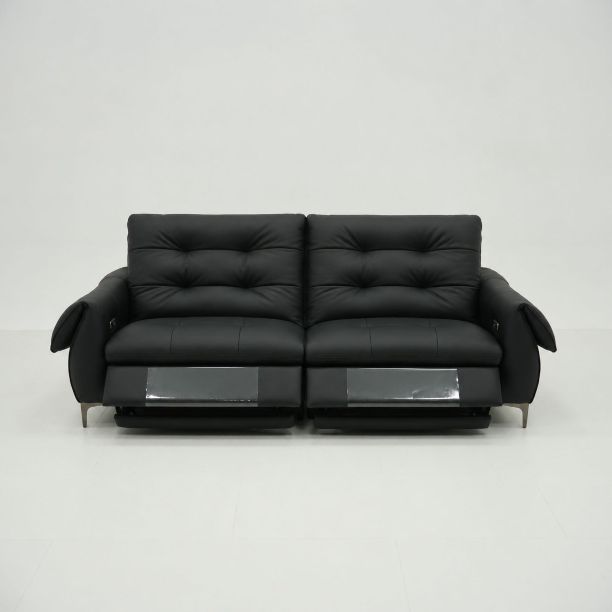 Black leather sofa on a white background