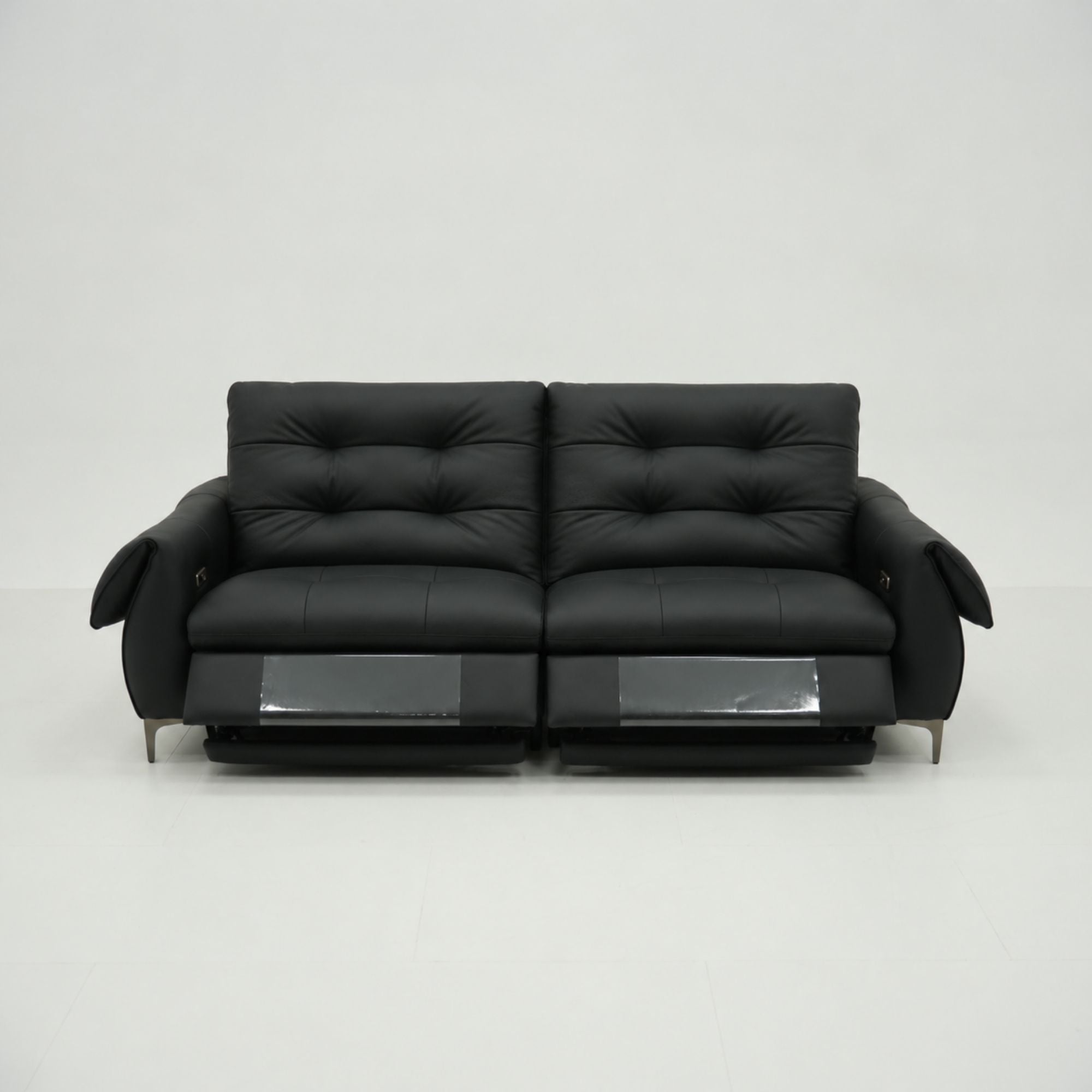 Black leather sofa on a white background