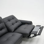 Black recliner sofa on a white background