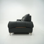 Black sofa with wooden armrest on a white background