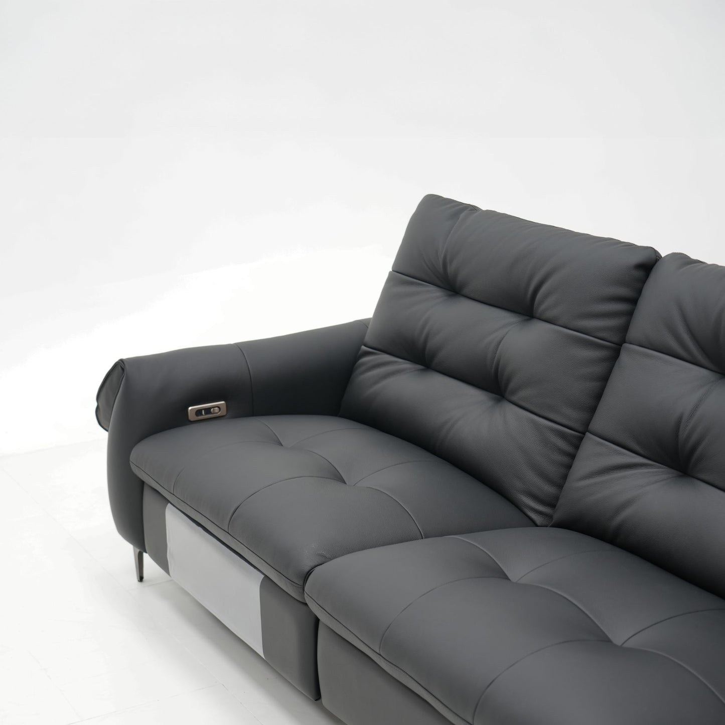 Black leather sofa on a white background