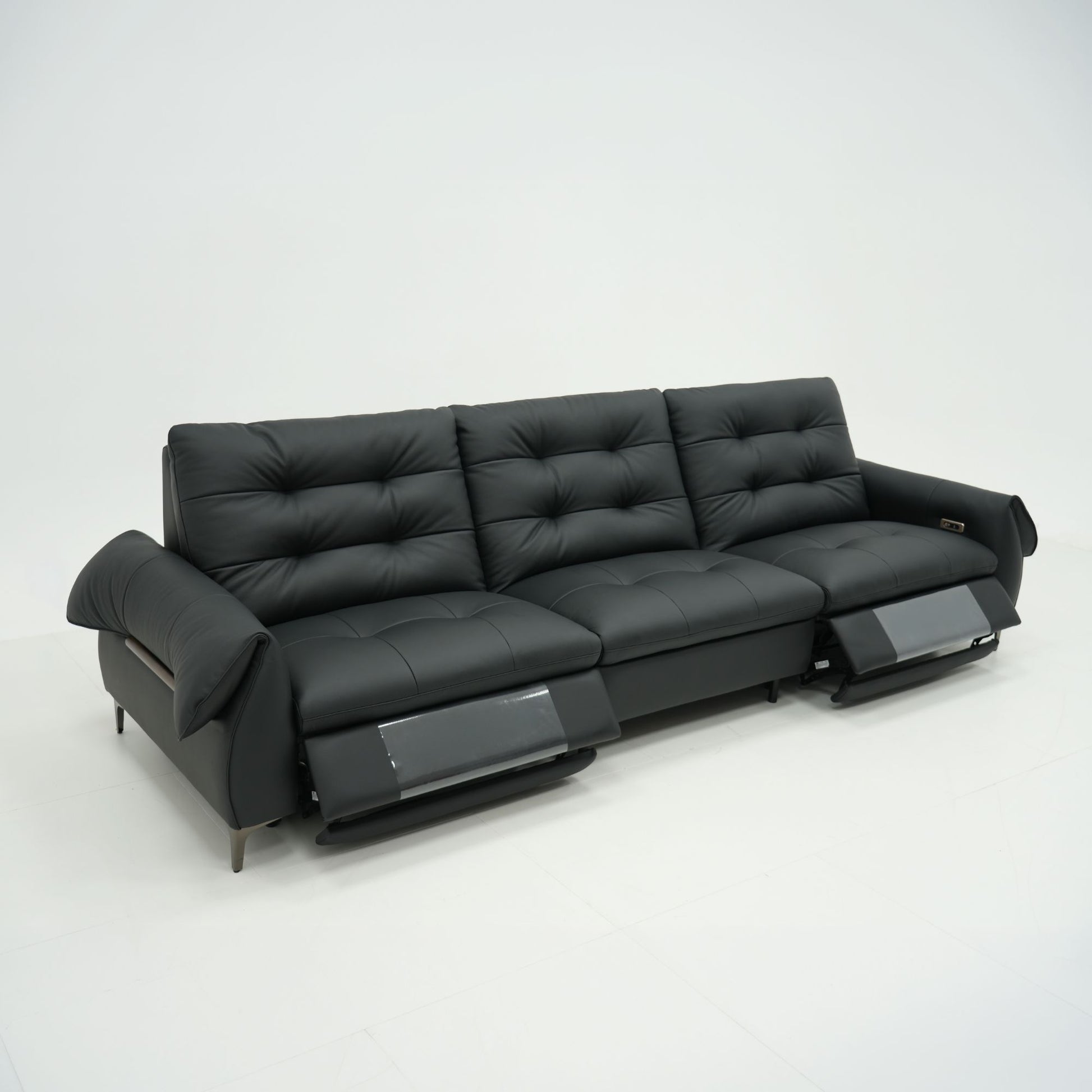 Black leather sofa on a white background