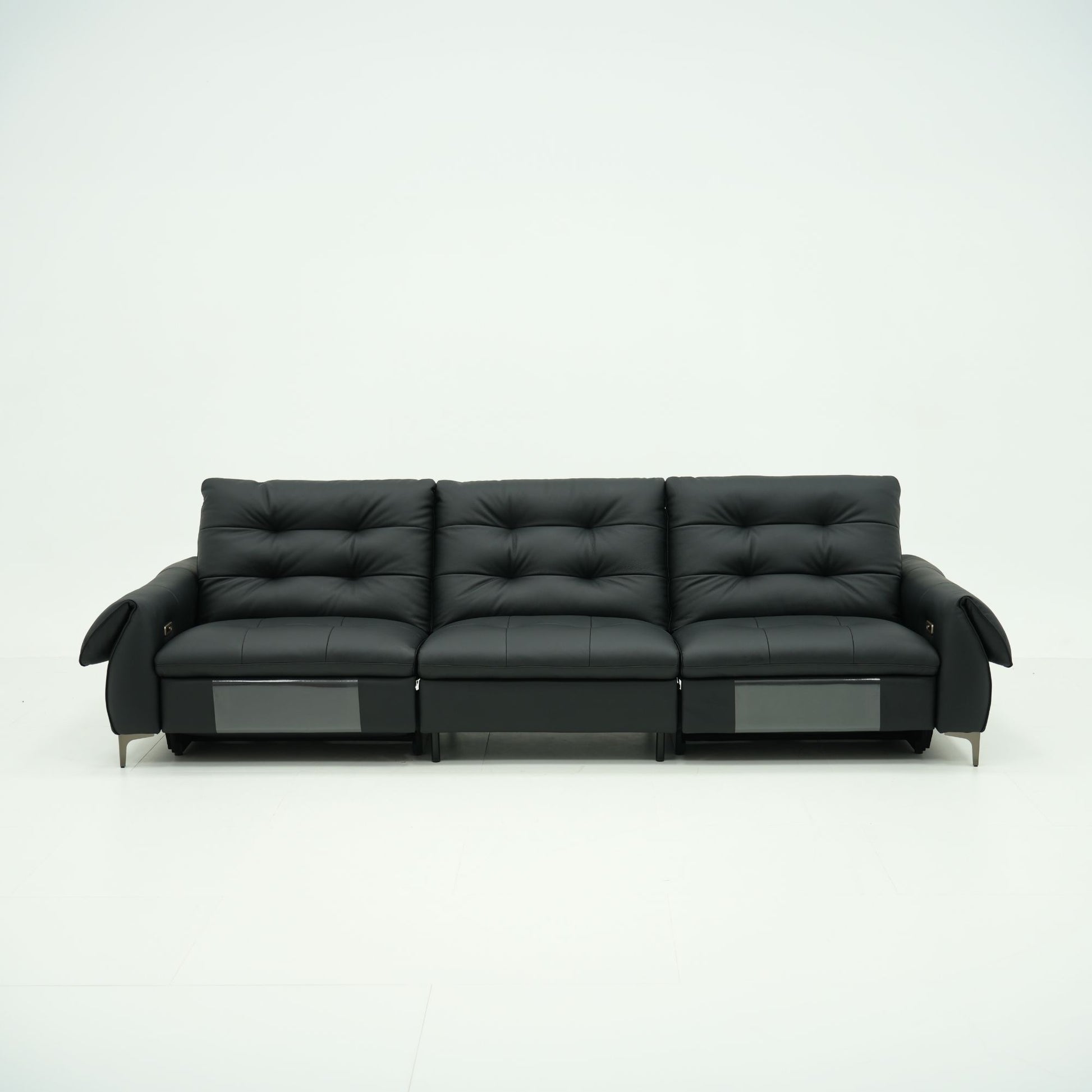Black leather sofa on a white background