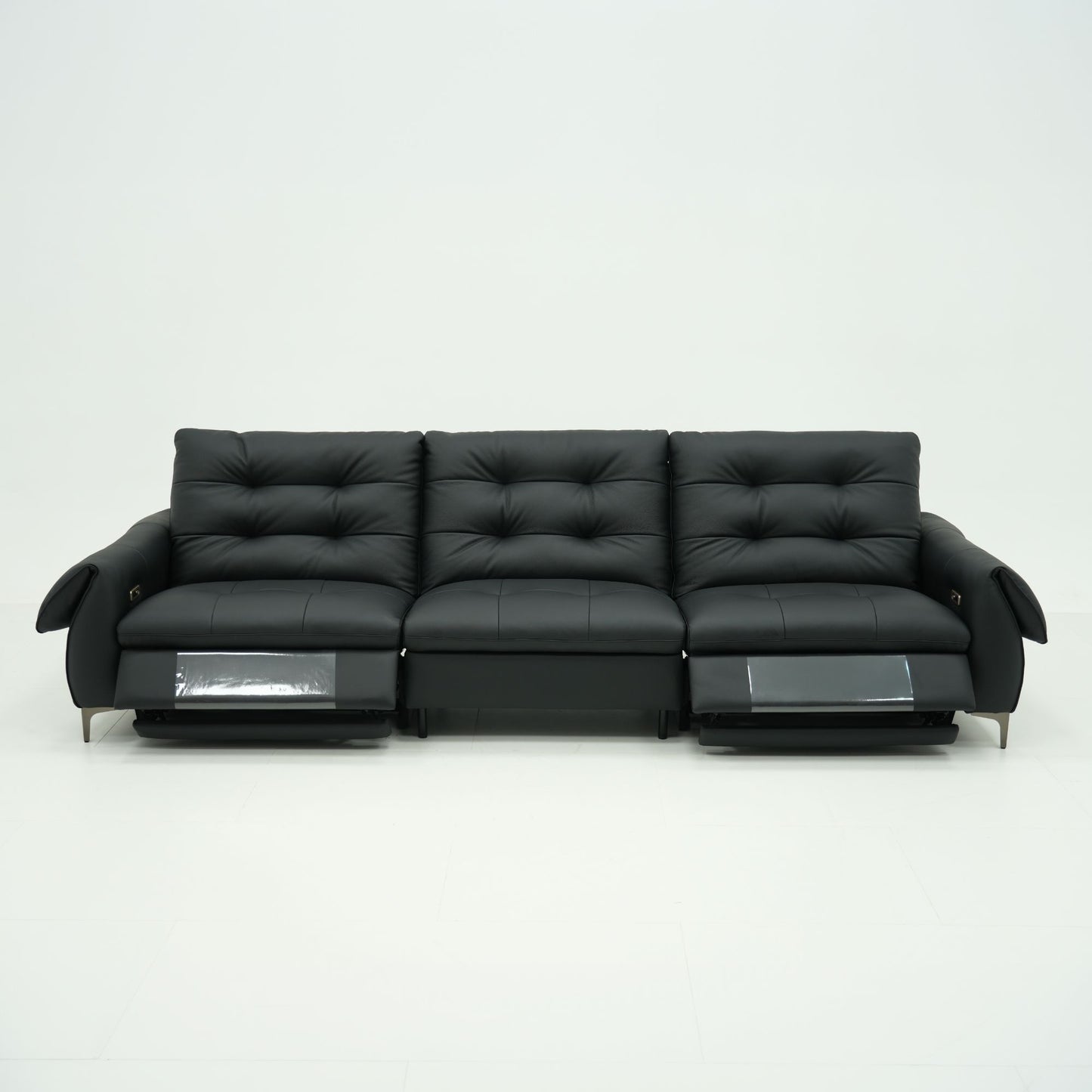 Black leather sofa on a white background