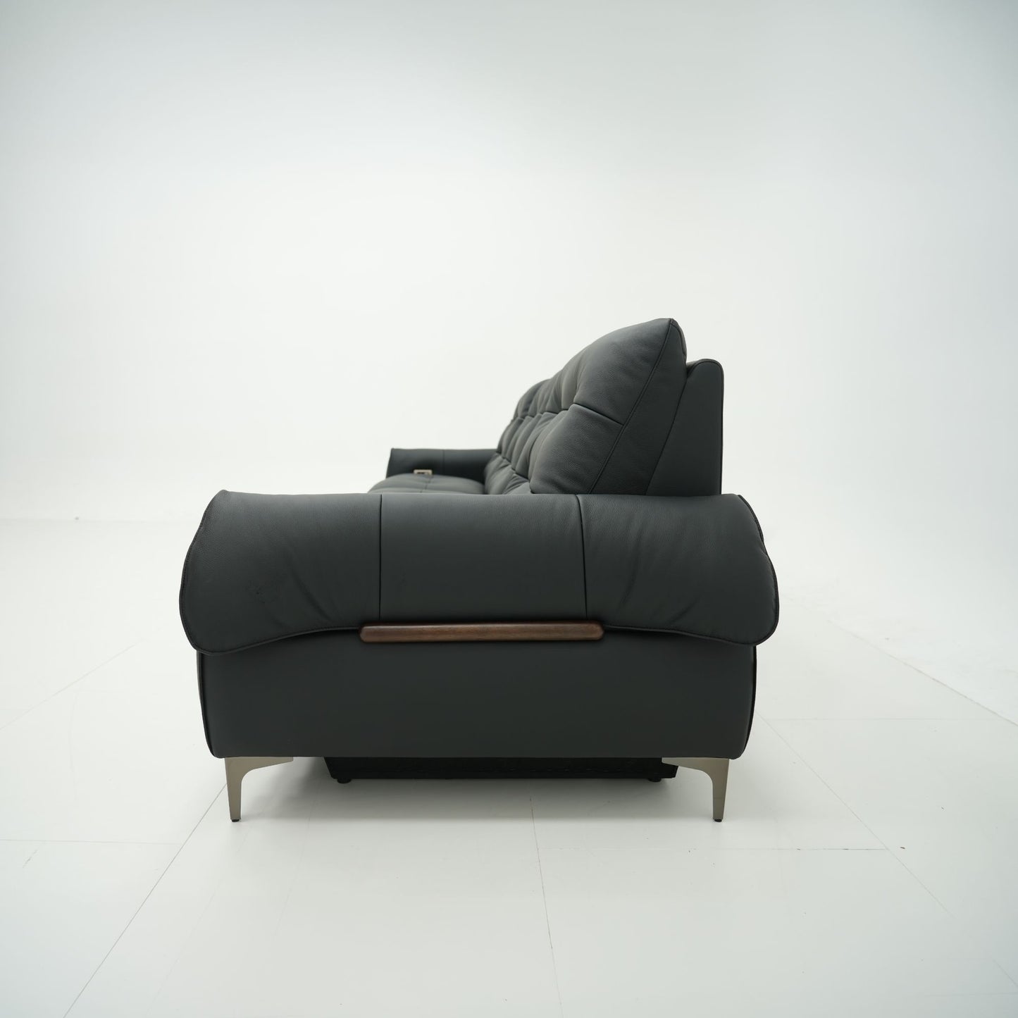 Black sofa with wooden armrest on a white background