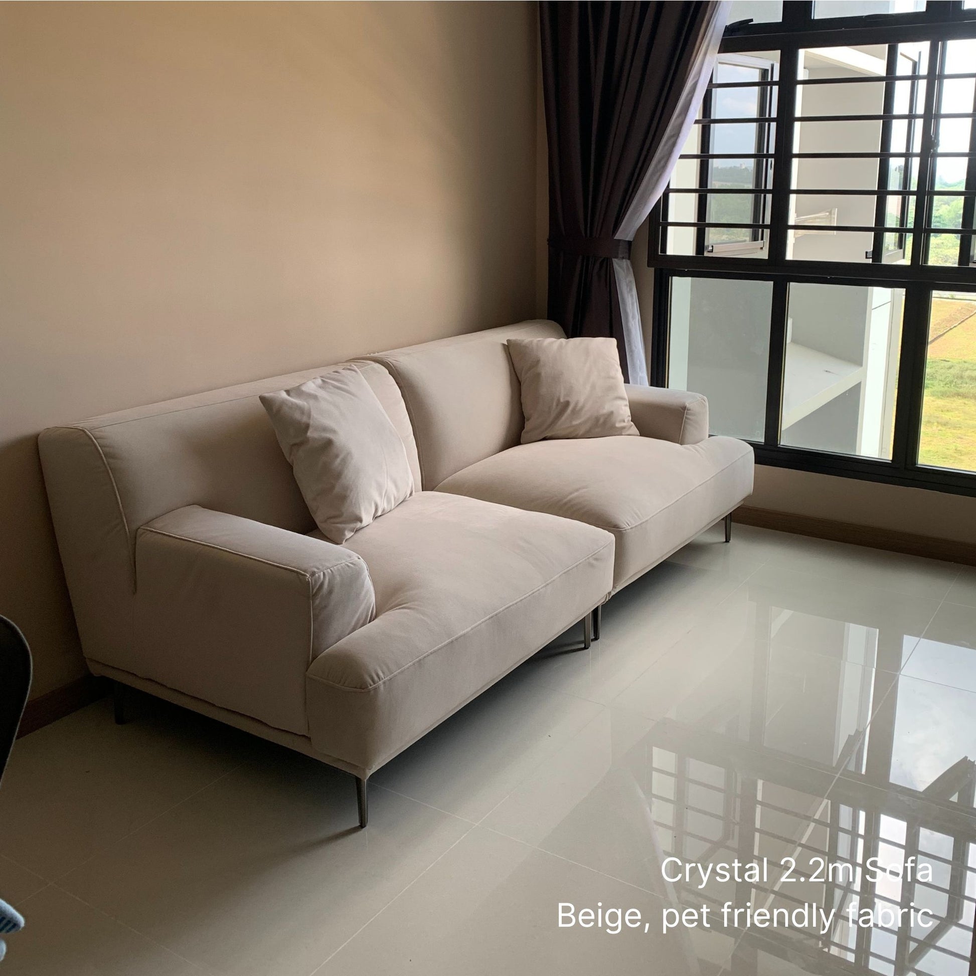3 seater 220cm Crystal beige pet friendly sofa in a living room with a window in the background