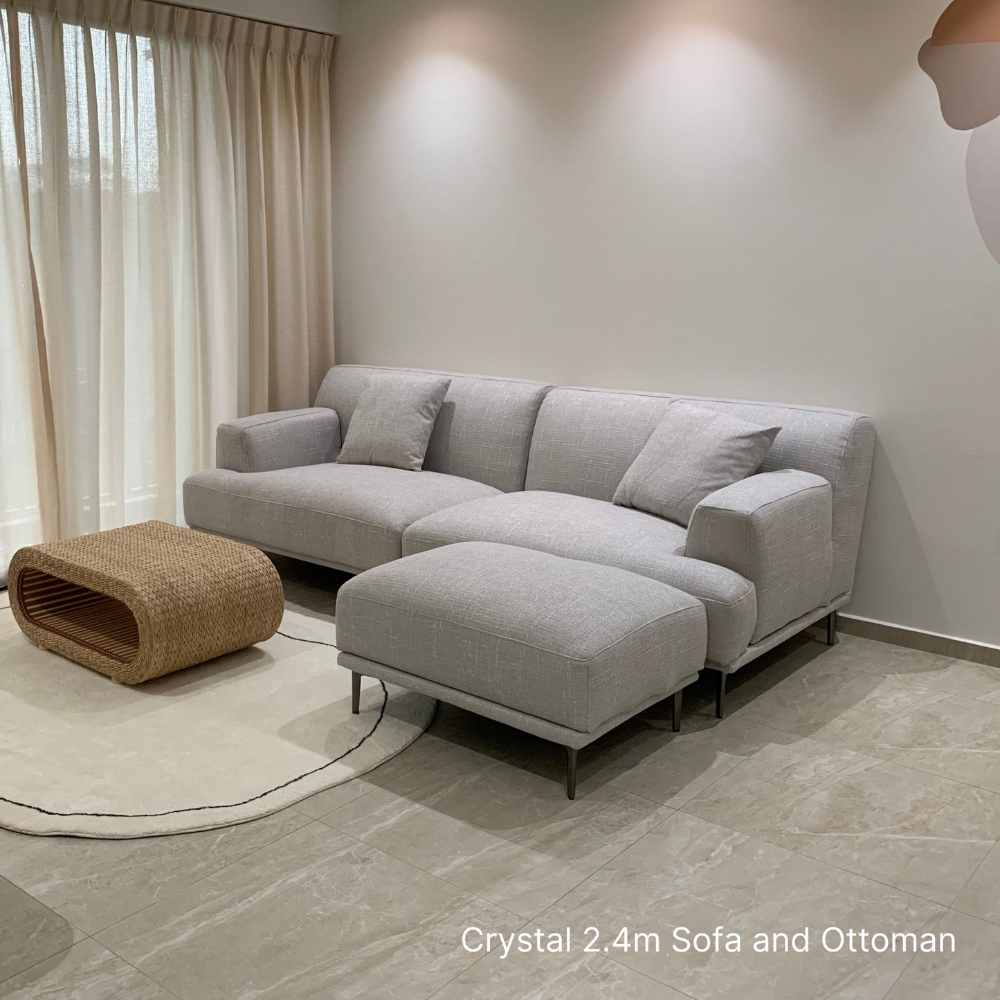 Crystal fabric ottoman at 80cm x 60cm in grey paired with a 3 seater Crystal grey fabric sofa
