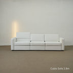 White Cubis sofa 2.8m against a plain wall with a neutral color scheme.