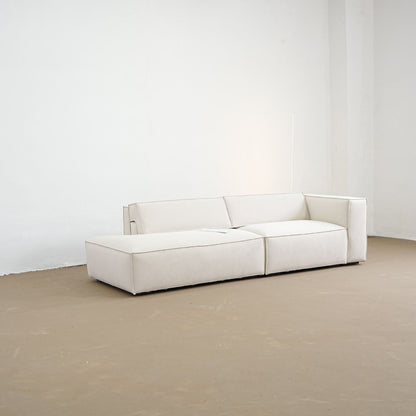 diagonal view of adjustable backrest sofa with one arm one the factory floor