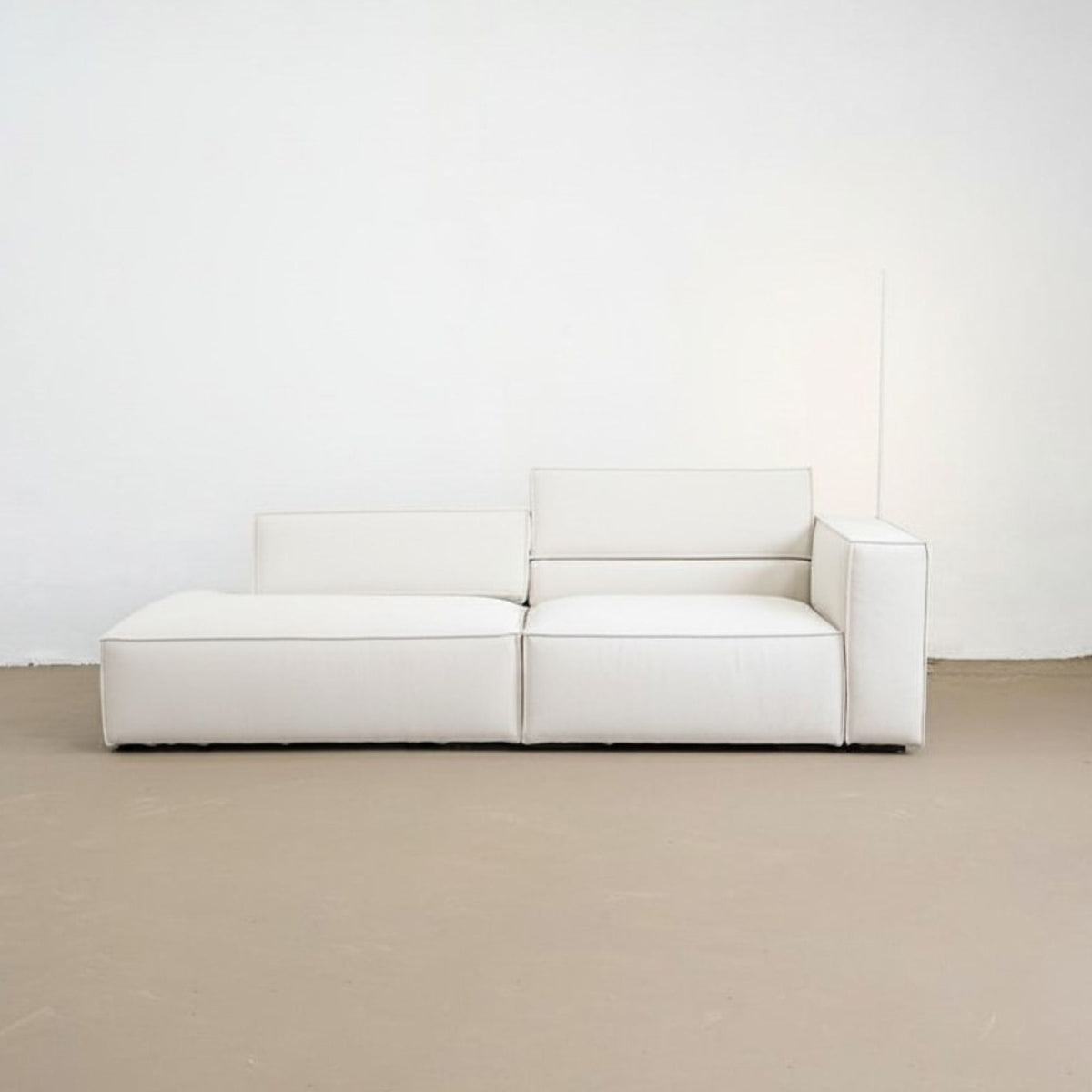 front view of cubix adjustable backrest fabric one arm sofa on the factory floor