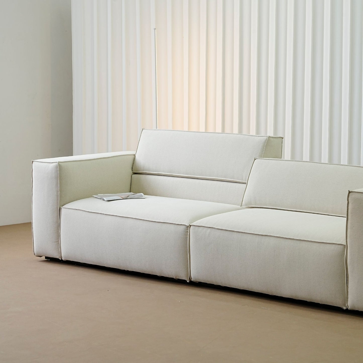 Cubix fabric adjustable backrest sofa in beige washable fabric, photo taken on the factory floor