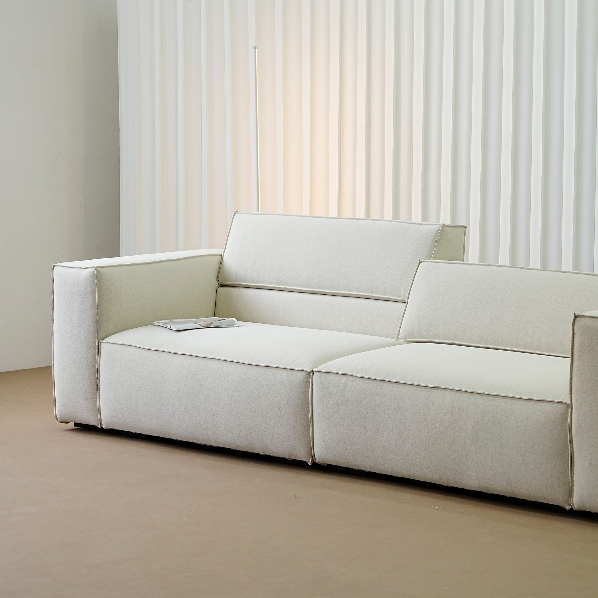 Cubix fabric adjustable backrest sofa in beige washable fabric, photo taken on the factory floor
