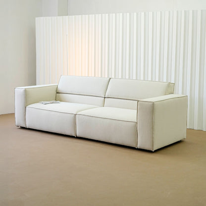 Cubix fabric adjustable backrest sofa in beige washable fabric, photo taken on the factory floor