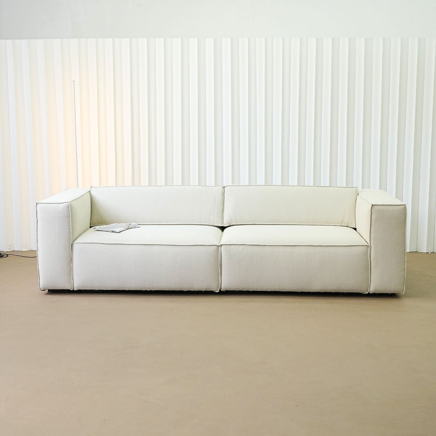 Cubix fabric adjustable backrest sofa in beige washable fabric, photo taken on the factory floor