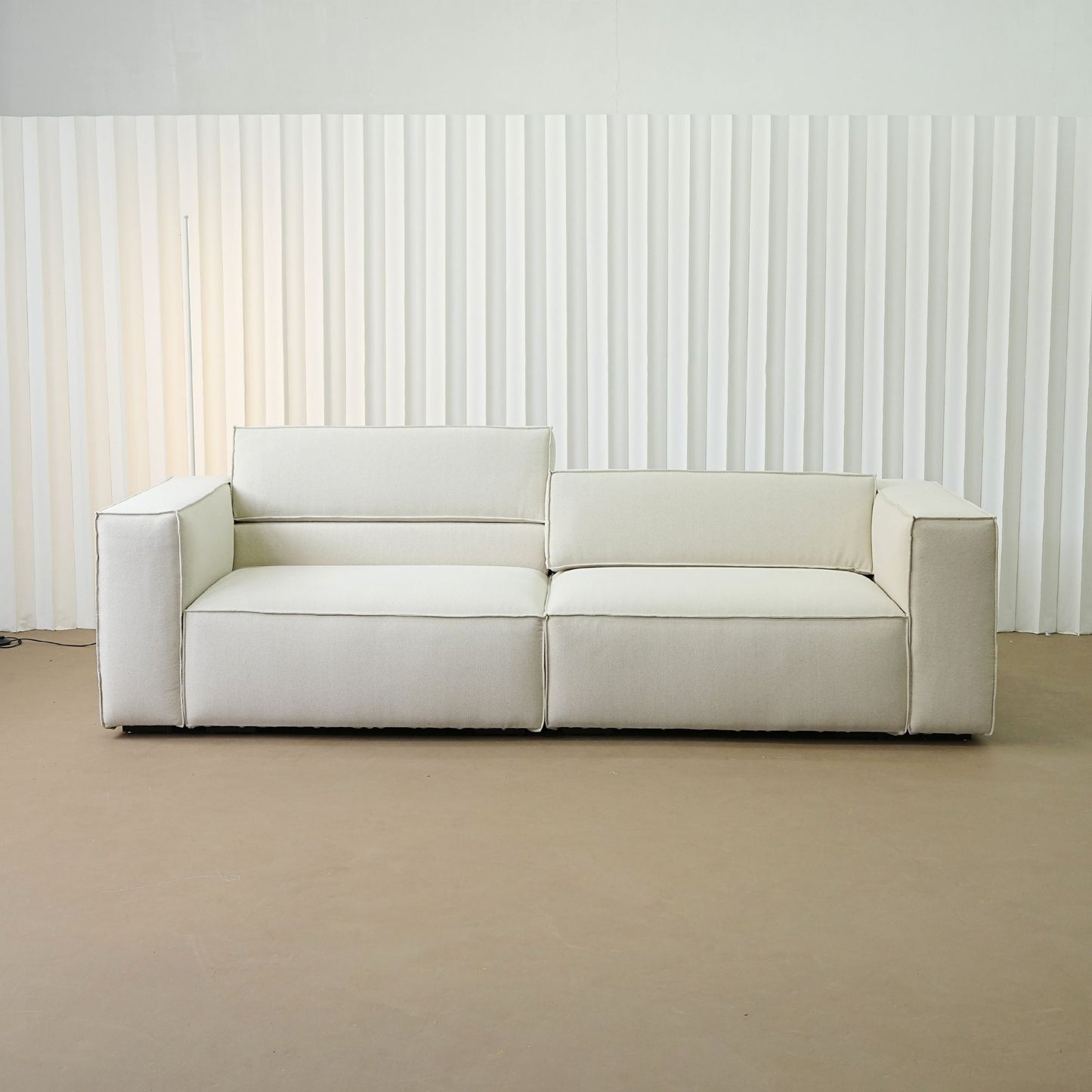 Cubix fabric adjustable backrest sofa in beige washable fabric, photo taken on the factory floor