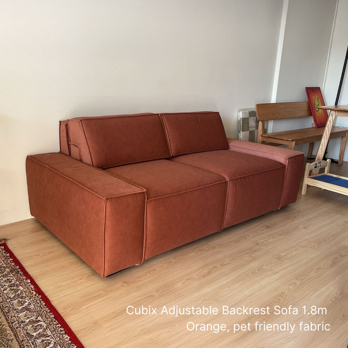 2 seater Cubix adjustable backrest sofa in orange pet friendly fabric at 180cm