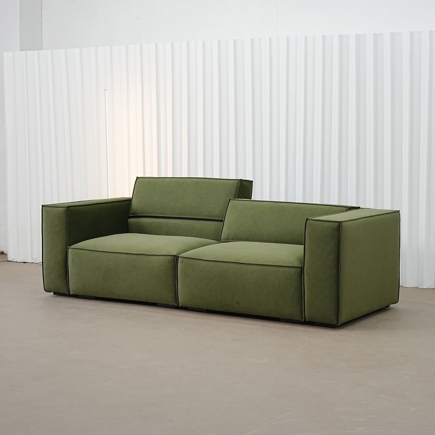 Cubix fabric adjustable backrest sofa in green pet friendly fabric, photo taken on the fabric floor