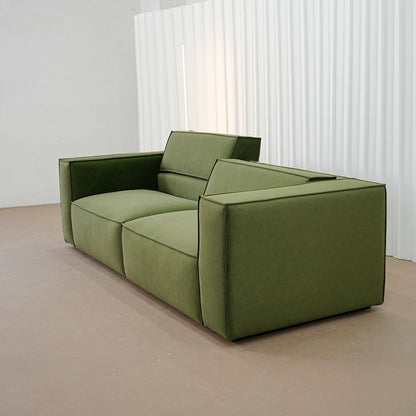 Cubix fabric adjustable backrest sofa in green pet friendly fabric, photo taken on the fabric floor
