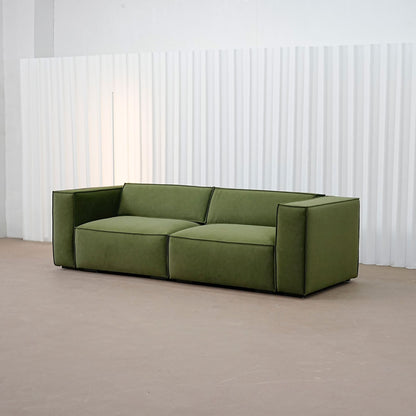 Cubix fabric adjustable backrest sofa in green pet friendly fabric, photo taken on the fabric floor