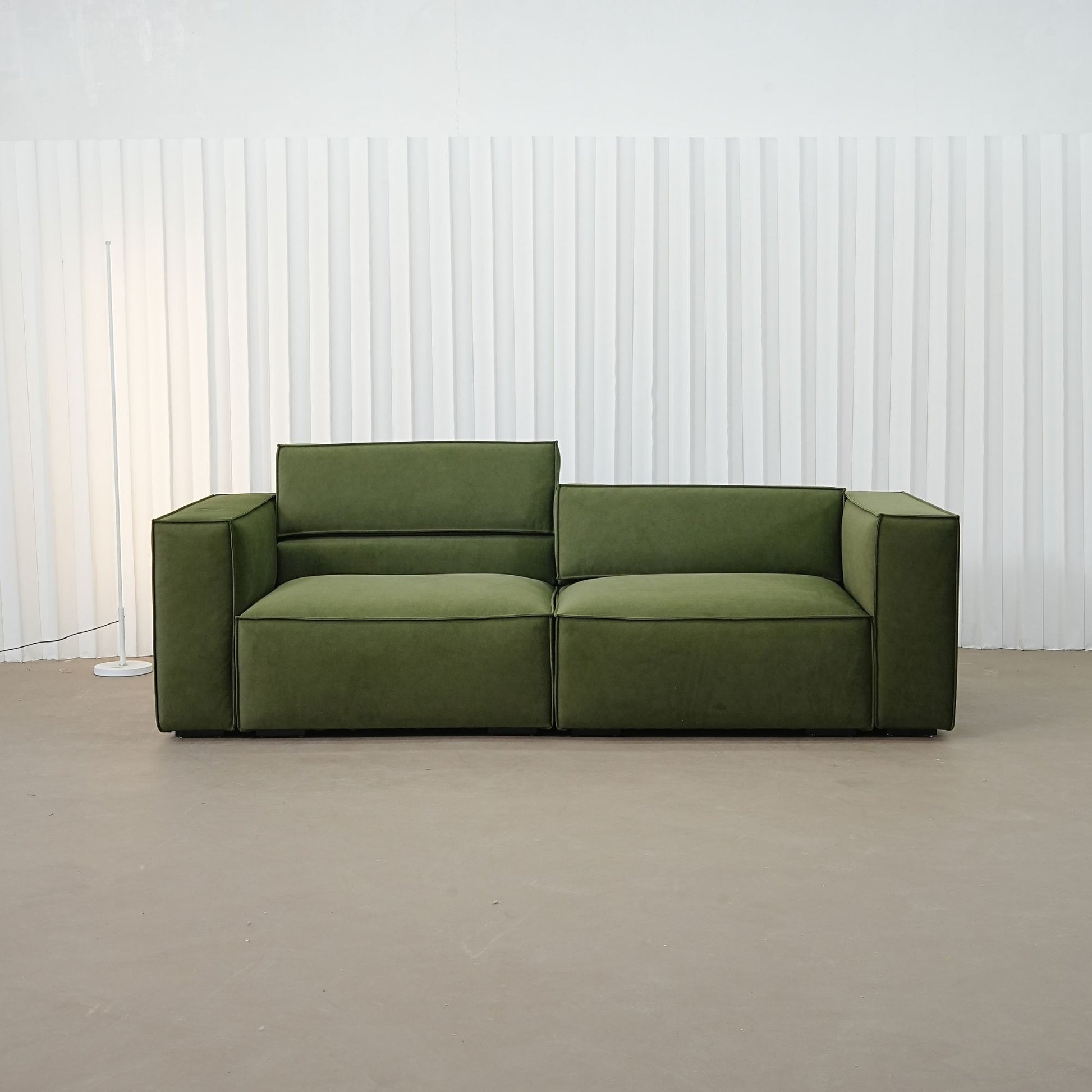 Cubix fabric adjustable backrest sofa in green pet friendly fabric, photo taken on the fabric floor